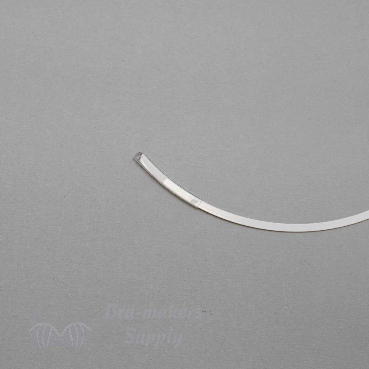 http://shop.gigisbrasupply.com/cdn/shop/products/heat-shrink-underwire-casing-UHS-316-from-Bra-Makers-Supply-on-underwire-flat-shown_1200x1200.jpg?v=1591644758